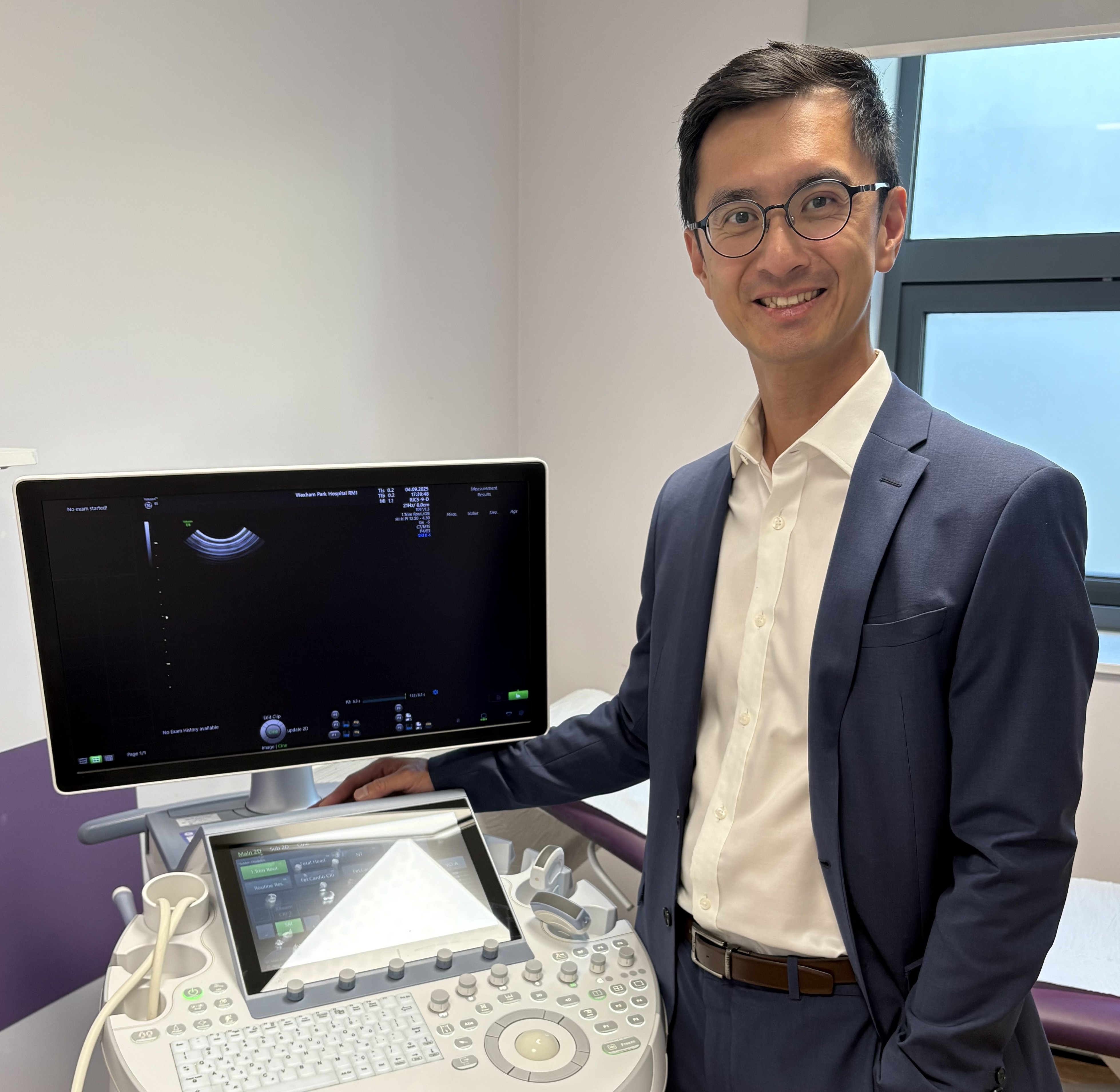 Mr Wenzhuang Chin with ultrasound equipment
